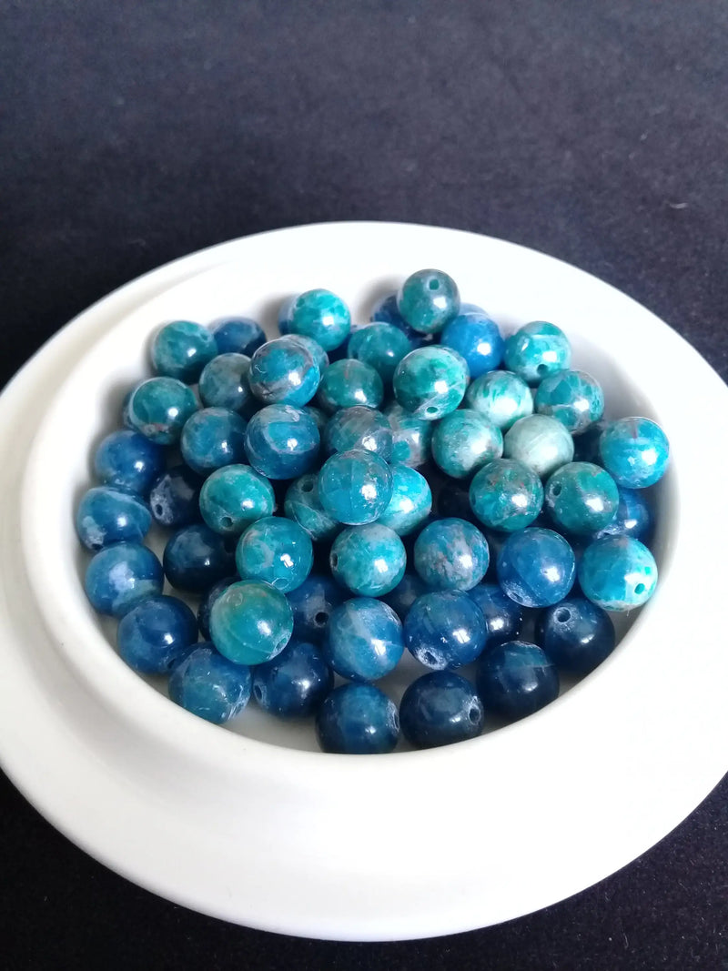 Load image into Gallery viewer, Apatite bleue du Brésil perle Grade A++++ Prix perle à l’unité Apatite bleue du Brésil perle 8mm Dans la besace du p&#39;tit Poucet   
