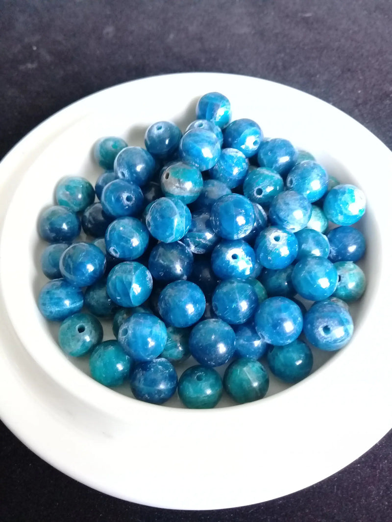 Laden Sie das Bild in Galerie -Viewer, Apatite bleue du Brésil perle Grade A++++ Prix perle à l’unité Apatite bleue du Brésil perle 8mm Dans la besace du p&#39;tit Poucet   
