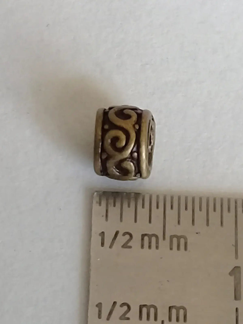 Load image into Gallery viewer, Breloque perle couleur Bronze ancien 5mm X 4mm Prix perle à l’unité Diamètre 4mm Perles breloque couleur Bronze ancien 5mm X 4mm
