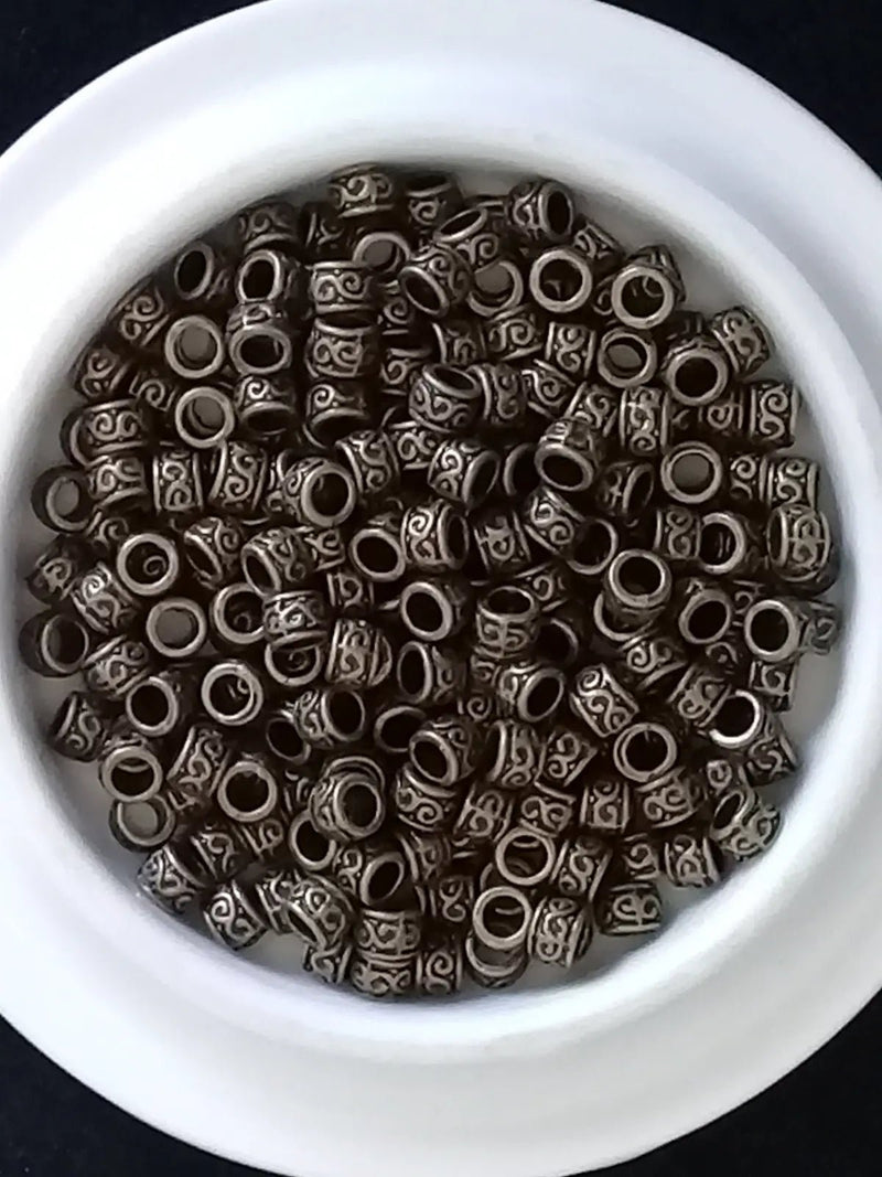 Load image into Gallery viewer, Breloque perle couleur Bronze ancien 5mm X 4mm Prix perle à l’unité Diamètre 4mm Perles breloque couleur Bronze ancien 5mm X 4mm
