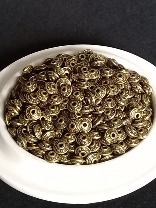 Breloque perle forme soucoupe Divers coloris 6mm X 4mm Prix perle à l’unité Perles breloque forme soucoupe Divers coloris