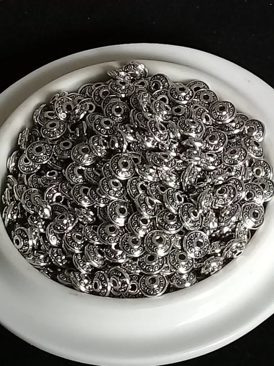 Breloque perle forme soucoupe Divers coloris 6mm X 4mm Prix perle à l’unité Perles breloque forme soucoupe Divers coloris