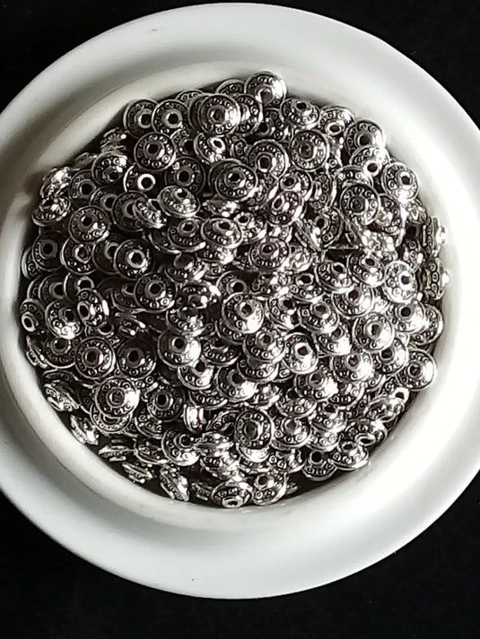 Breloque perle forme soucoupe Divers coloris 6mm X 4mm Prix perle à l’unité Perles breloque forme soucoupe Divers coloris