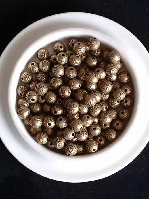 Breloque perle métal couleur Bronze ancien Diamètre 7mm Prix perle à l’unité Diamètre 7mm Perles breloque métal couleur Bronze ancien