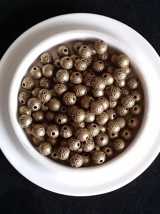 Breloque perle métal couleur Bronze ancien Diamètre 7mm Prix perle à l’unité Diamètre 7mm Perles breloque métal couleur Bronze ancien