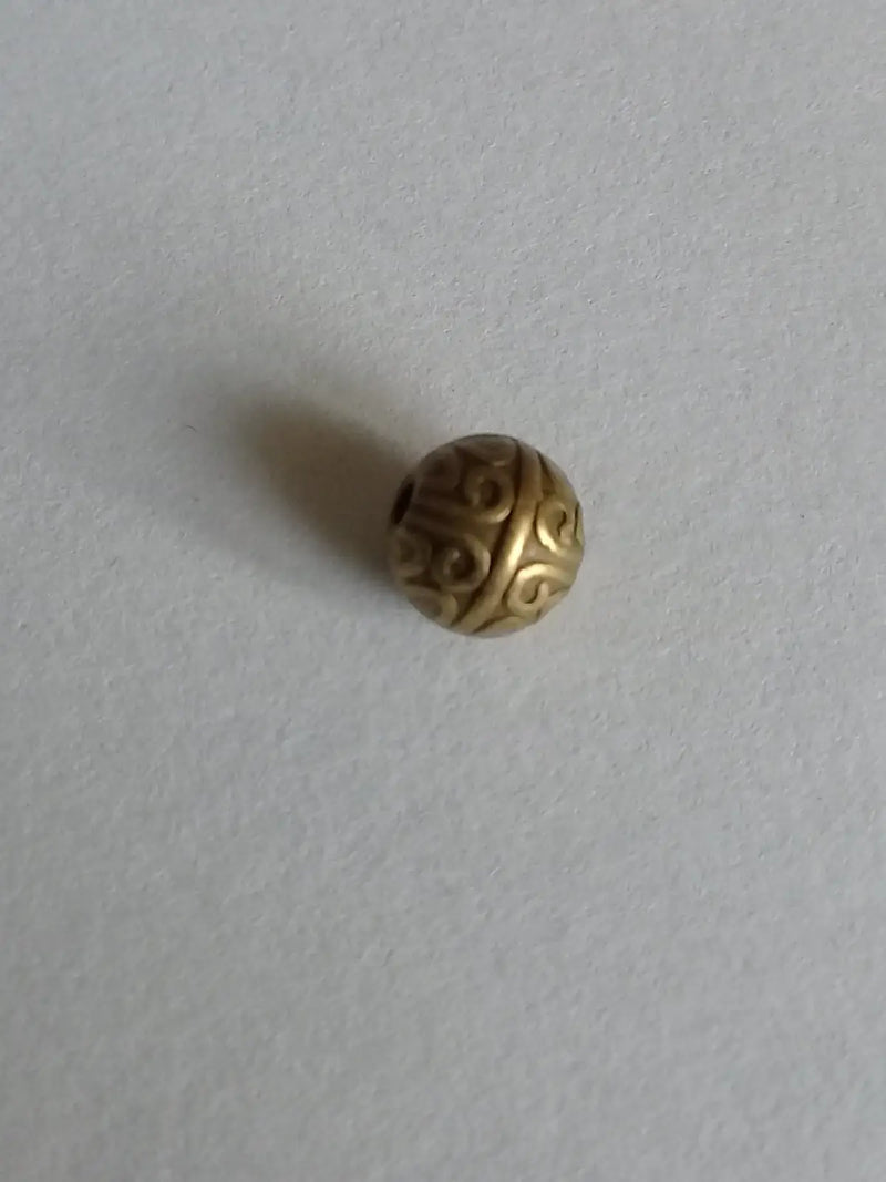 Chargez l'image dans la visionneuse de la galerie, Breloque perle métal couleur Bronze ancien Diamètre 7mm Prix perle à l’unité Diamètre 7mm Perles breloque métal couleur Bronze ancien
