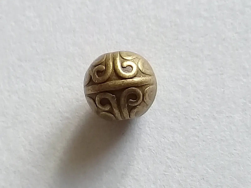 Chargez l'image dans la visionneuse de la galerie, Breloque perle métal couleur Bronze ancien Diamètre 7mm Prix perle à l’unité Diamètre 7mm Perles breloque métal couleur Bronze ancien
