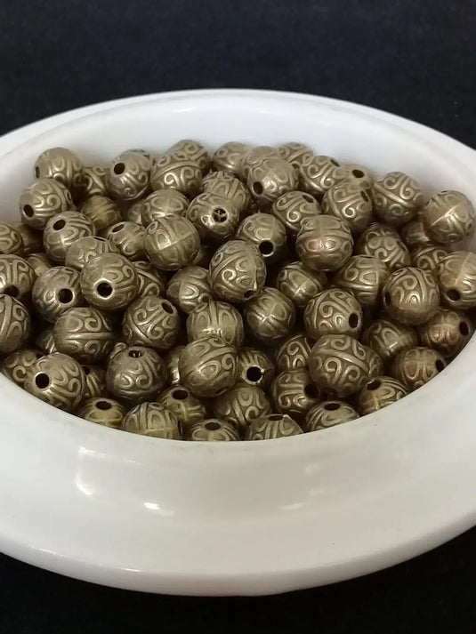 Breloque perle métal couleur Bronze ancien Diamètre 7mm Prix perle à l’unité Diamètre 7mm Perles breloque métal couleur Bronze ancien