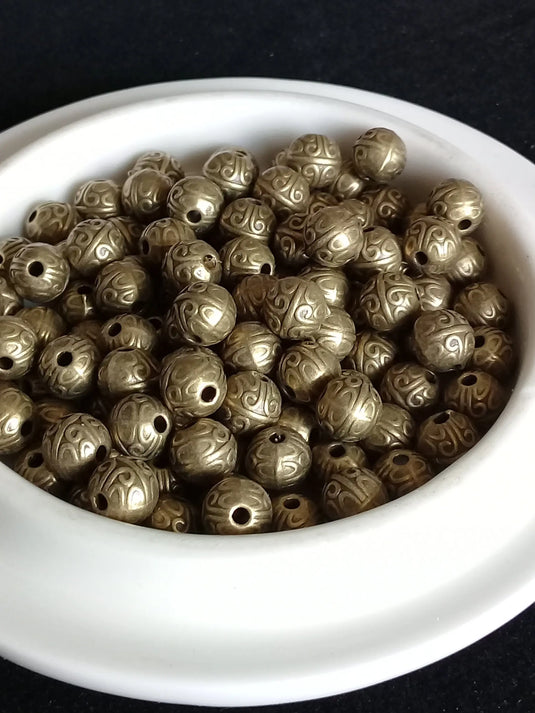 Breloque perle métal couleur Bronze ancien Diamètre 7mm Prix perle à l’unité Perles breloque métal couleur Bronze ancien Diamètre 7mm Dans la besace du p'tit Poucet   