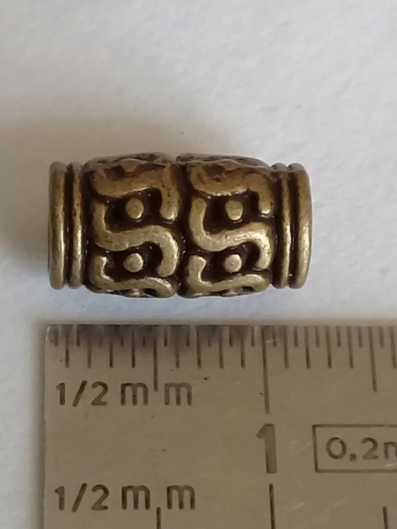 Load image into Gallery viewer, Breloque perle tube couleur Bronze ancien 12mm X 7mm Prix perle à l’unité Diamètre 7mm Perles tube couleur Bronze ancien
