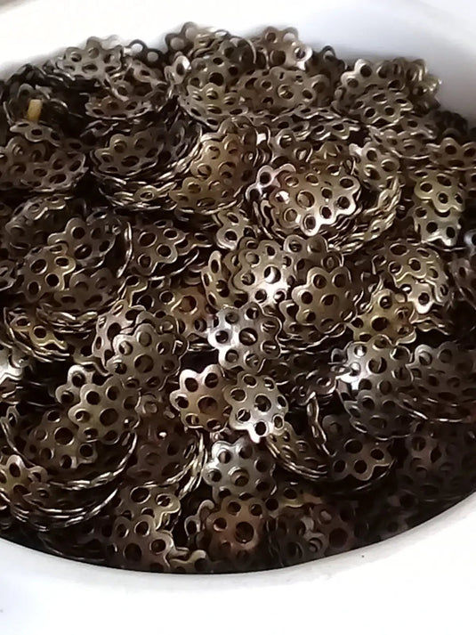 Breloques séparatifs Divers coloris Diam: 6mm Prix à l’unité Bronze ancien Breloques séparatifs Divers coloris Diam: 6mm