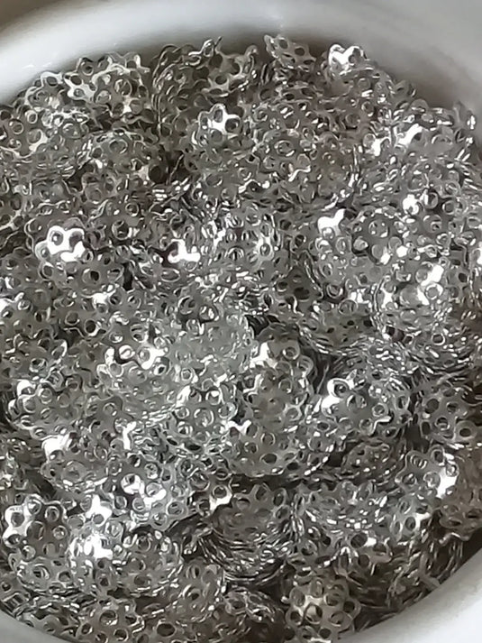 Breloques séparatifs Divers coloris Diam: 6mm Prix à l’unité Breloques séparatifs Divers coloris Diam: 6mm