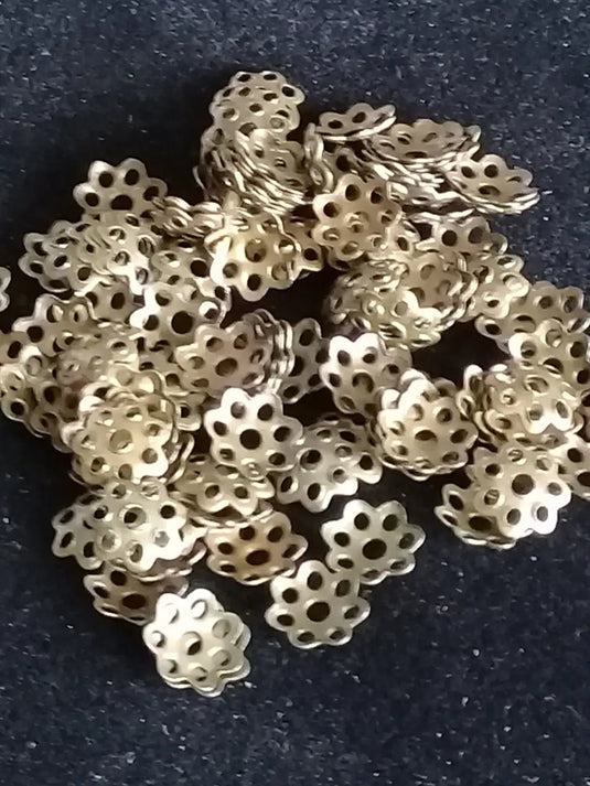 Breloques séparatifs Divers coloris Diam: 6mm Prix à l’unité Breloques séparatifs Divers coloris Diam: 6mm