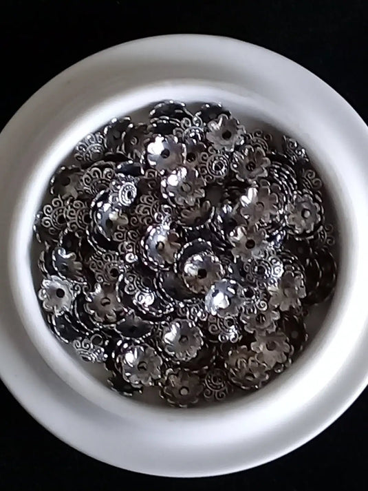 Breloques séparatifs Divers coloris Diam: 6mm Prix à l’unité Breloques séparatifs Divers coloris Diam: 6mm