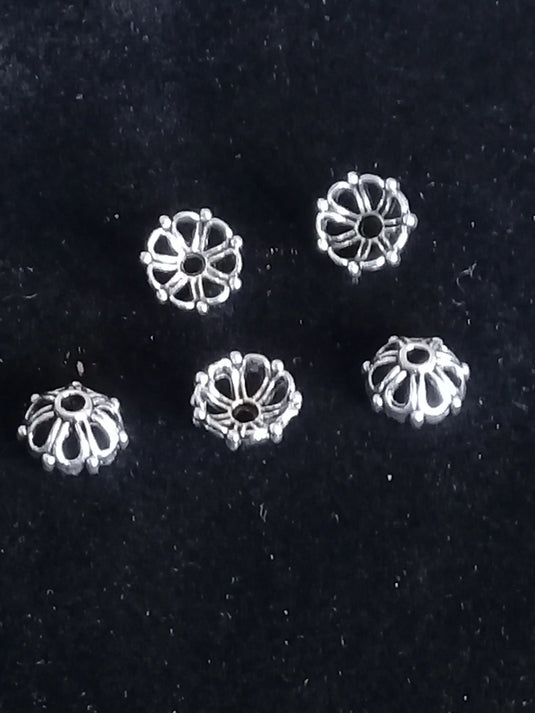 Breloques séparatifs perles couleur argent Diam : 6mm Prix à l’unité Breloques séparatifs couleur Argent Diam : 6mm Dans la besace du p'tit Poucet   