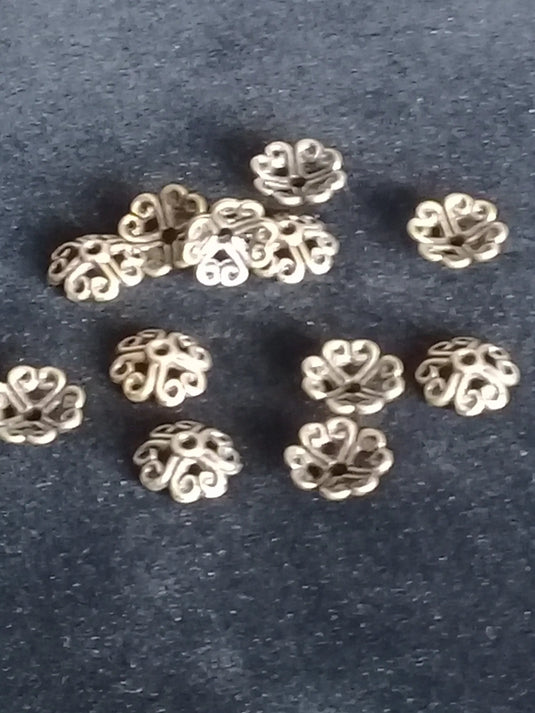 Breloques séparatifs perles métal couleur Bronze ancien Prix à l’unité Breloques séparatifs perles métal couleur Bronze ancien Dans la besace du p'tit Poucet   