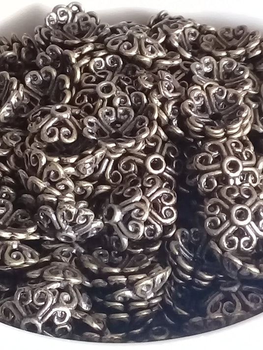Breloques séparatifs perles métal couleur Bronze ancien Prix à l’unité Breloques séparatifs perles métal couleur Bronze ancien Dans la besace du p'tit Poucet   