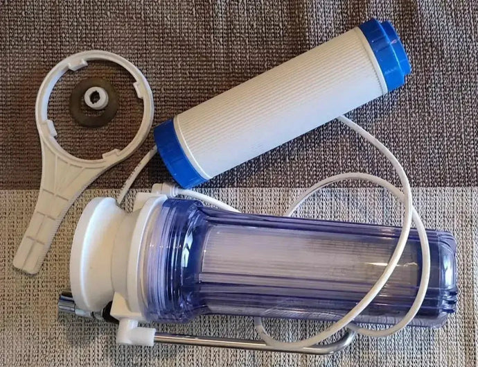 Filtre mono-cartouche shungite. Retient pesticides herbicides chlore métaux lourds shungite système de filtration