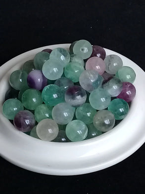 Fluorite de France perle Grade A++++ Prix perle à l’unité Fluorite de France perles 8mm Dans la besace du p'tit Poucet Diamètre 8mm  