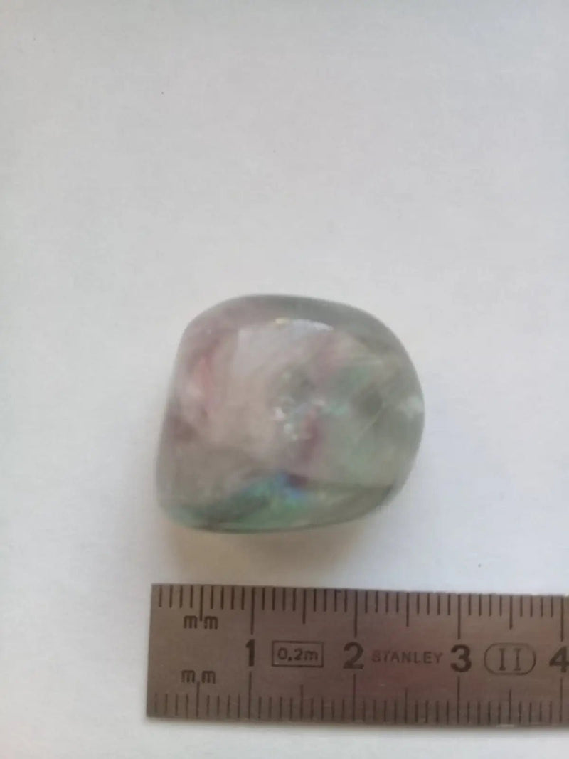 Load image into Gallery viewer, Fluorite violette verte et claire de France pierre roulée Grade A++++ Fluorite violette verte et claire de France pierre roulée
