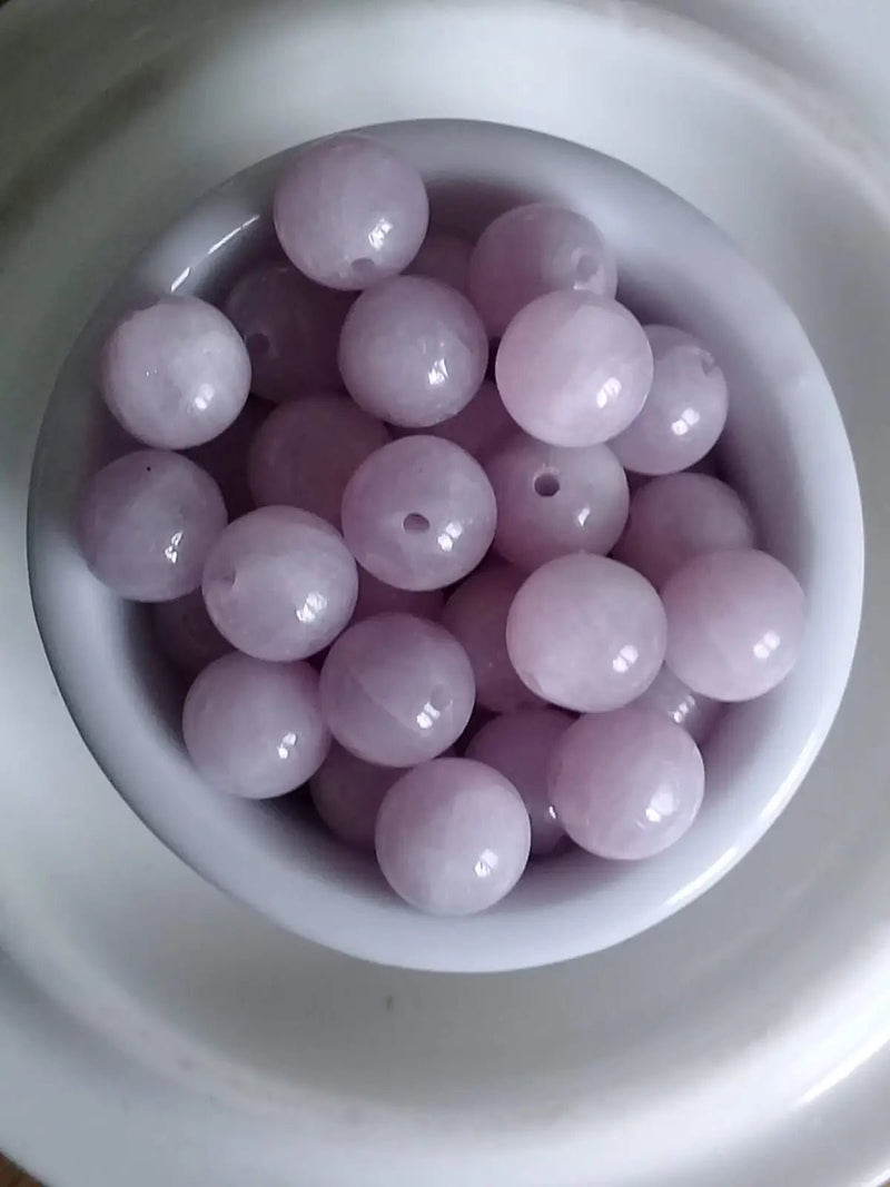 Load image into Gallery viewer, Kunzite de Birmanie perle Grade A++++ Prix perle à l’unité Diam 8mm Kunzite de Birmanie perle
