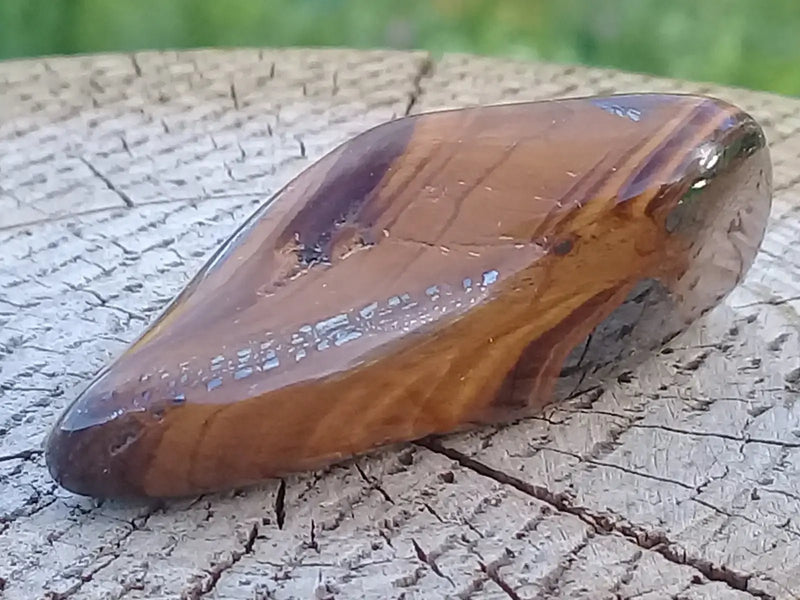 Load image into Gallery viewer, Œil de Tigre et Hématite pierre roulée Grade A ++++ Œil de Tigre avec Hématite pierre roulée
