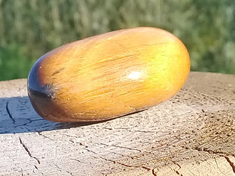 Load image into Gallery viewer, Œil de Tigre pierre roulée Grade A ++++ Œil de Tigre pierre roulée
