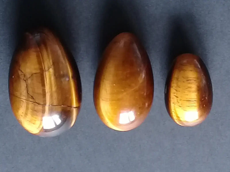 Load image into Gallery viewer, Œuf ’ Tantra Yoni ’ en Œil de tigre du Brésil Grade A ++++ Kit 3 tailles Œuf ’ Tantra Yoni ’ en Œil de tigre du Brésil Kit 3 tailles
