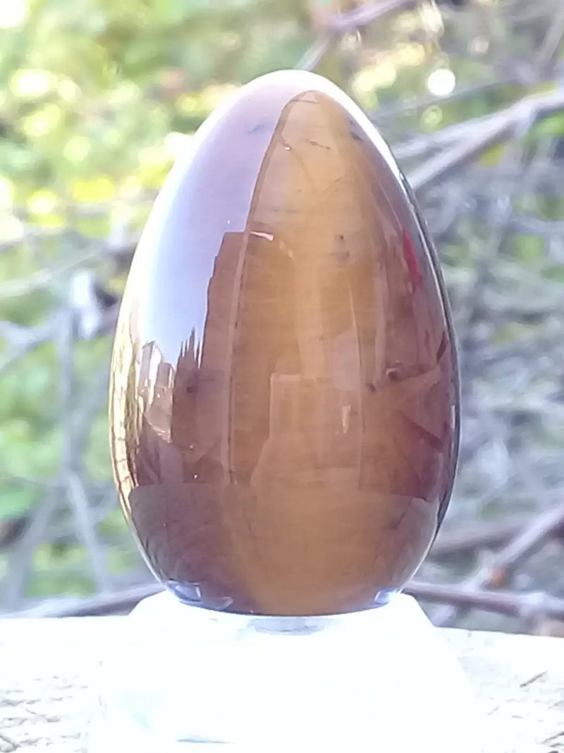 Load image into Gallery viewer, Œuf ’ Tantra Yoni ’ en Œil de tigre du Brésil Grade A ++++ Moyen modèle Œuf ’ Tantra Yoni ’ en Œil de tigre du Brésil Moyen modèle
