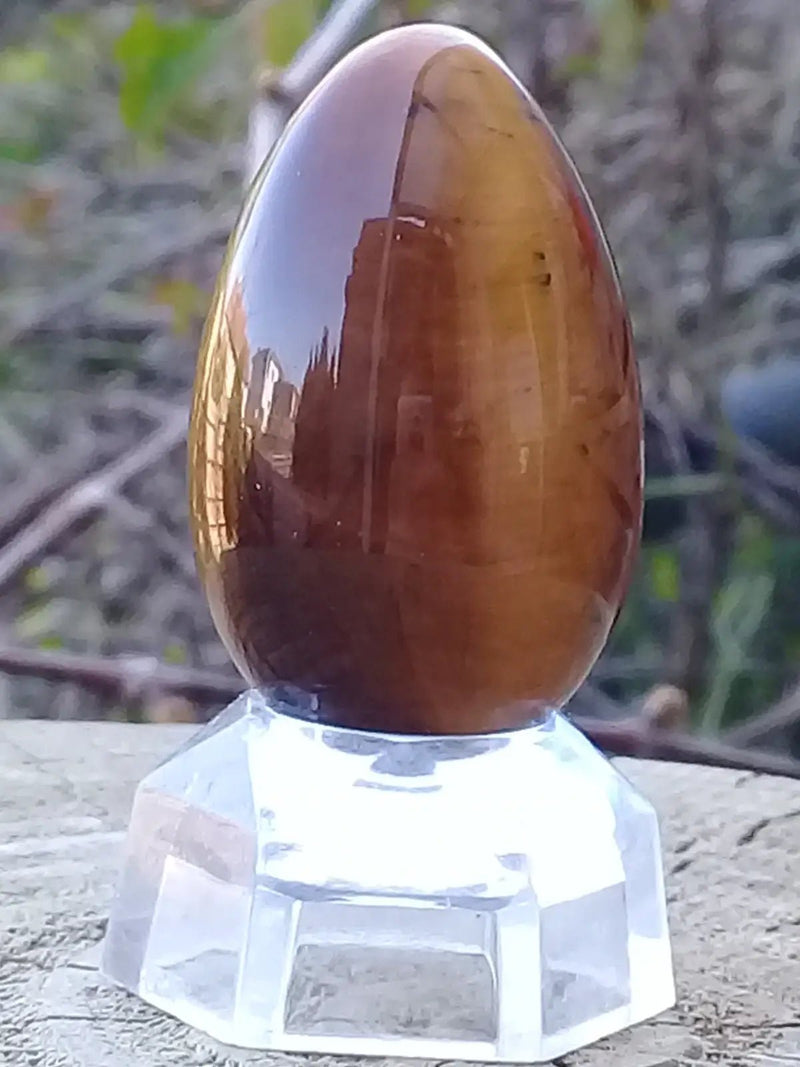 Load image into Gallery viewer, Œuf ’ Tantra Yoni ’ en Œil de tigre du Brésil Grade A ++++ Moyen modèle Œuf ’ Tantra Yoni ’ en Œil de tigre du Brésil Moyen modèle
