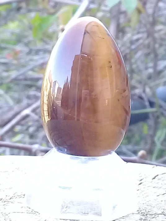 Œuf ’ Tantra Yoni ’ en Œil de tigre du Brésil Grade A ++++ Moyen modèle Œuf ’ Tantra Yoni ’ en Œil de tigre du Brésil Moyen modèle