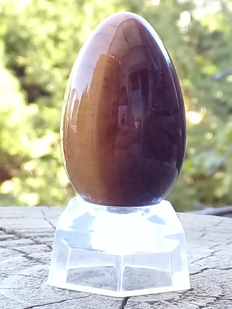 Load image into Gallery viewer, Œuf ’ Tantra Yoni ’ en Œil de tigre du Brésil Grade A ++++ Moyen modèle Œuf ’ Tantra Yoni ’ en Œil de tigre du Brésil Moyen modèle
