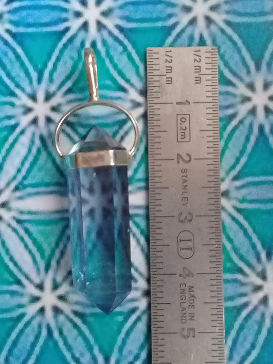Pendule Cristal Aqua-Tanzine-Aura monté sur Argent 925 Grade A ++++ Pendule Cristal Aqua-Tanzine-Aura monté sur Argent 925 Dans la besace du p'tit Poucet...   