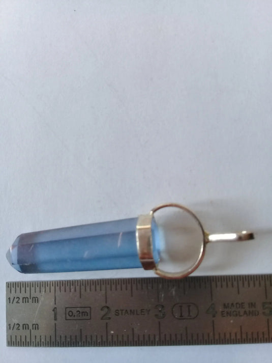 Pendule en Cristal Aqua-Tanzine-Aura monté sur argent 925 Grade A ++++ Pendule Cristal Aqua-Tanzine-Aura monté sur Argent 925 Dans la besace du p'tit Poucet...   