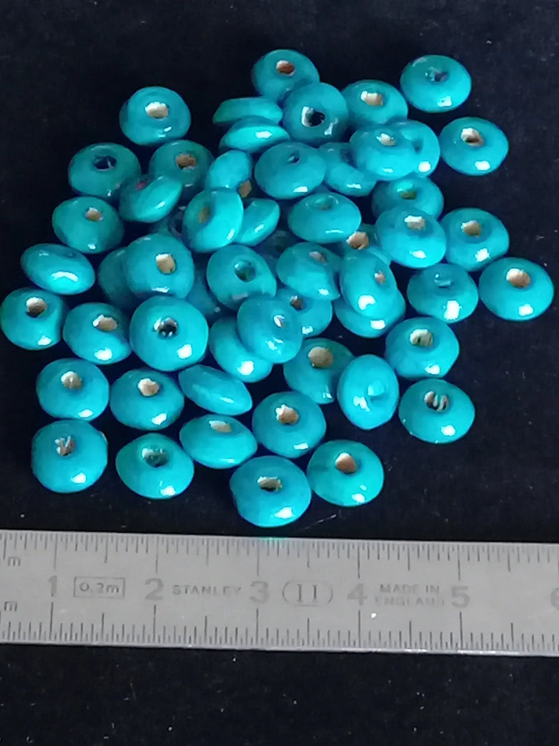 Load image into Gallery viewer, Perle bois bleue Chrysocolle Diam : 8mm X 4mm Prix perle à l’unité Perle bois bleue Diamètre 8mm X 4mm Prix perle à l&#39;unité Dans la besace du p&#39;tit Poucet   
