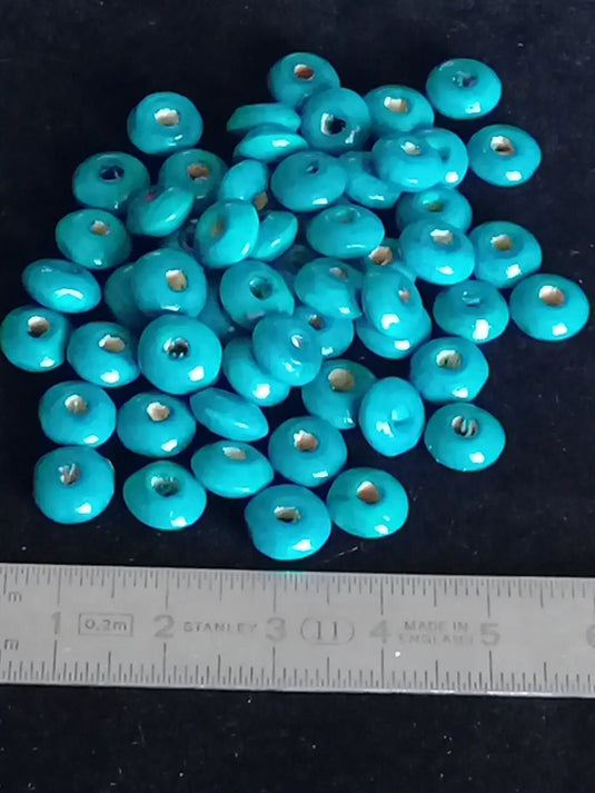 Perle bois bleue Chrysocolle Diam: 8mm X 4mm Prix perle à l’unité Perle bois bleue Diamètre 8mm X 4mm Prix perle à l’unité
