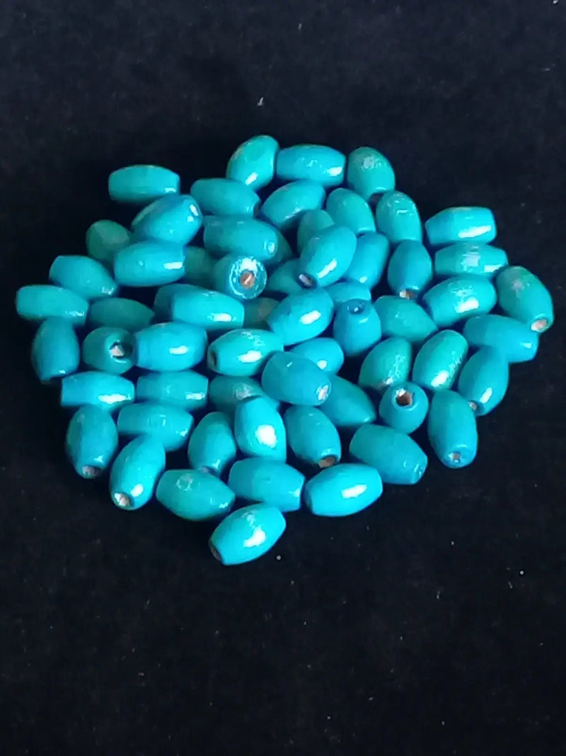 Chargez l'image dans la visionneuse de la galerie, Perle bois bleue Turquoise Diam: 4mm X 8mm Prix perle à l’unité Perle bois bleue Diam: 4mm X 8mm
