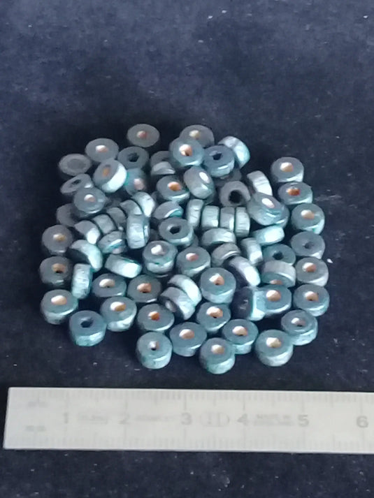 Perles bois couleur bleue Diam : 8mm X 4mm Prix perle à l’unité Perles bois couleur bleue pétrole Diam : 8mm X 4mm Dans la besace du p'tit Poucet   