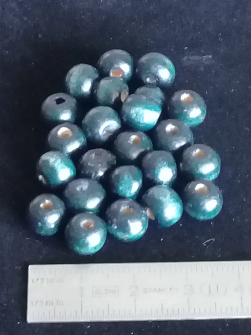 Load image into Gallery viewer, Perles bois couleur bleue Diam : 8mm X 6mm Prix perle à l’unité Perles bois couleur bleue pétrole Diam : 8mm X 4mm Dans la besace du p&#39;tit Poucet   
