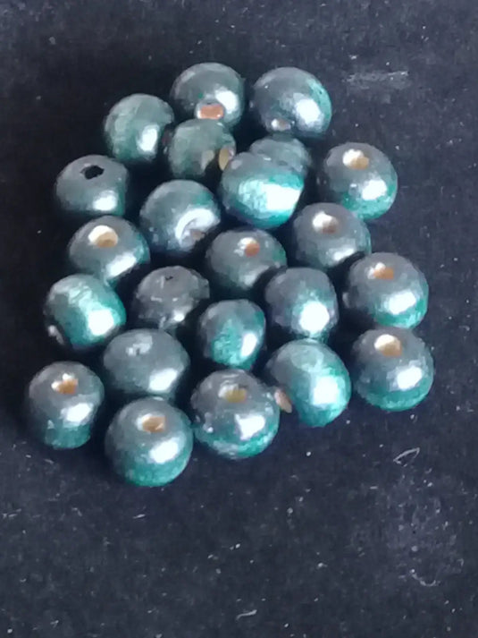 Perles bois couleur bleue Diam: 8mm X 6mm Prix perle à l’unité Perles bois couleur bleue pétrole Diam: 8mm X 4mm