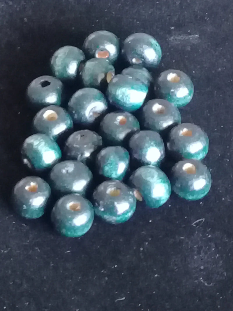 Chargez l&#39;image dans la visionneuse de la galerie, Perles bois couleur bleue Diam : 8mm X 6mm Prix perle à l’unité Perles bois couleur bleue pétrole Diam : 8mm X 4mm Dans la besace du p&#39;tit Poucet   
