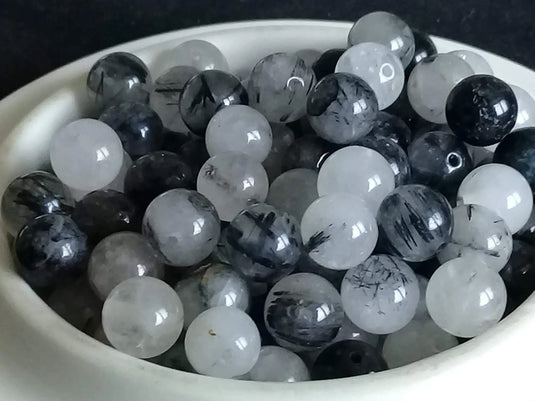 Quartz inclusions de Tourmaline Grade A++++ Prix perle à l’unité Quartz à inclusions de Tourmaline noire perle Dans la besace du p'tit Poucet Diam 8mm  