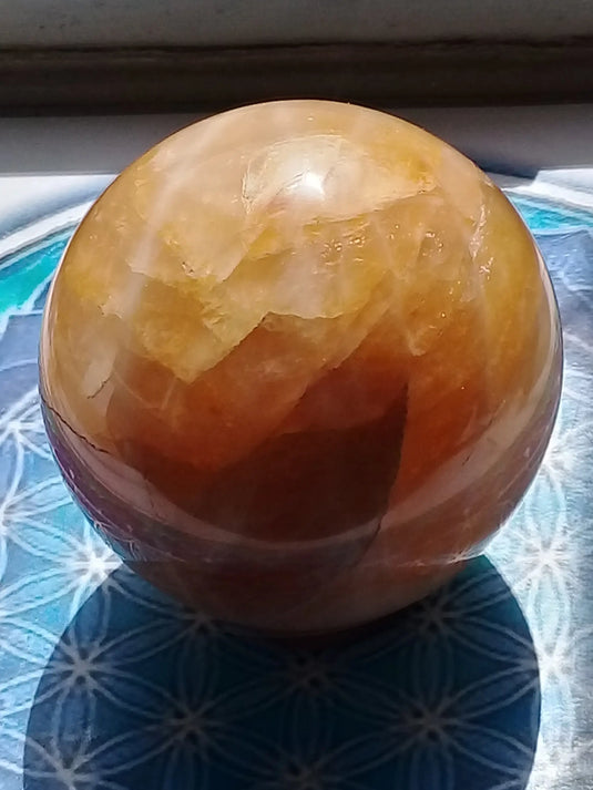 Sphère Calcite miel Grade A ++++ Diam 7cm Sphère Calcite miel Dans la besace du p'tit Poucet...   