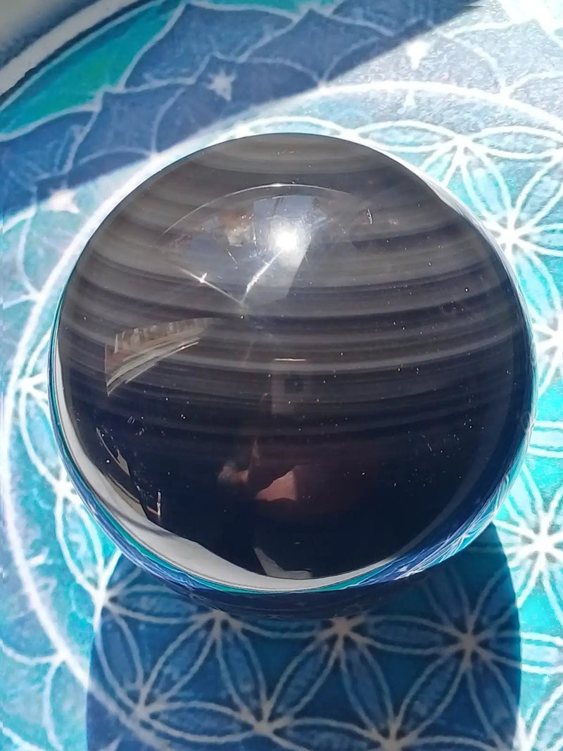 Chargez l&#39;image dans la visionneuse de la galerie, Sphère Obsidienne Œil céleste Grade A ++++ Diamètre 7,7cm Sphère Obsidienne Œil céleste

